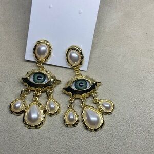 Joan Rivers Green Eye Earrings
